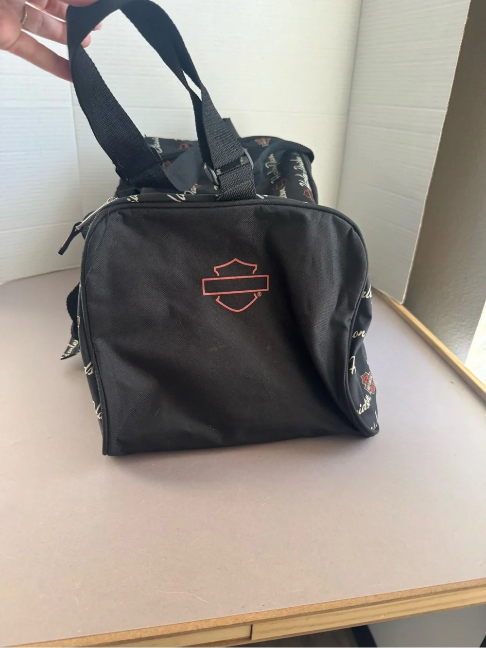 Harley-Davidson Black Duffel with White Script and Orange Accents